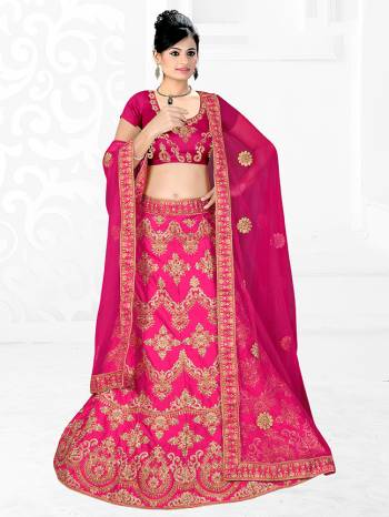 Here Is A Very Beautiful Heavy Designer Bridal Lehenga Choli In All Over Dark Pink. Its Blouse And Lehenga Are Fabricated On Satin Silk Paired With Net Fabricated Dupatta. It Is Beautified With Heavy Embroidery Giving It An Attractive Look. 