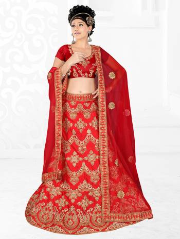 Get Ready For Your D-Day With This Very Beautiful And Evergreen Color For A Bridal Wear With This Designer Lehenga Choli In Red Color. This Heavy Embroidered Lehenga Choli Is Satin Silk Based Paired With Net Fabricated Dupatta. Its Lovely Bright Color And Heavy Embroidery Will Add Pretty Glam Look.