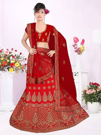 Get Ready For Your D-Day With This Very Beautiful And Evergreen Color For A Bridal Wear With This Designer Lehenga Choli In Red Color. This Heavy Embroidered Lehenga Choli Is Satin Silk Based Paired With Net Fabricated Dupatta. Its Lovely Bright Color And Heavy Embroidery Will Add Pretty Glam Look.