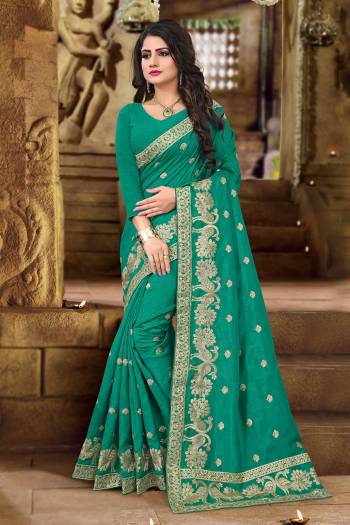 Get Ready For The Upcoming Festive And Wedding Season With This Designer Saree In Sea Green Color. This Saree And Blouse Are Fabricated On Art Silk Beautified with Jari Embroidery In Lovely Peacock Motifs. This Pretty Saree Is Light Weight And Easy To Carry All Day Long. 