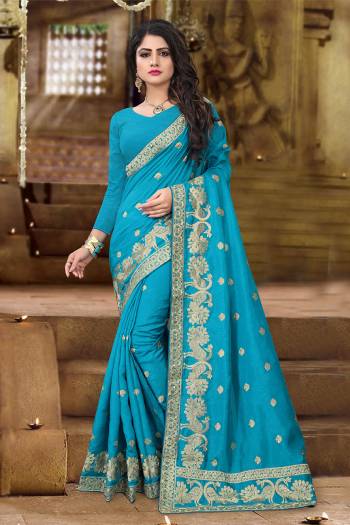 Get Ready For The Upcoming Festive And Wedding Season With This Designer Saree In Blue Color. This Saree And Blouse Are Fabricated On Art Silk Beautified with Jari Embroidery In Lovely Peacock Motifs. This Pretty Saree Is Light Weight And Easy To Carry All Day Long. 