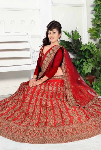 Get Ready For Your D-Day With This Very Beautiful And Evergreen Color For A Bridal Wear With This Designer Lehenga Choli In Red Color. This Heavy Embroidered Lehenga Choli Is Satin Silk Based Paired With Net Fabricated Dupatta. Its Lovely Bright Color And Heavy Embroidery Will Add Pretty Glam Look.