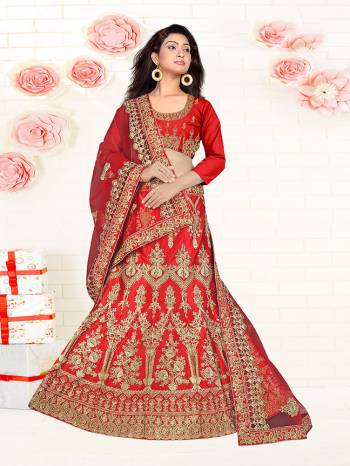 Get Ready For Your D-Day With This Very Beautiful And Evergreen Color For A Bridal Wear With This Designer Lehenga Choli In Red Color. This Heavy Embroidered Lehenga Choli Is Satin Silk Based Paired With Net Fabricated Dupatta. Its Lovely Bright Color And Heavy Embroidery Will Add Pretty Glam Look.