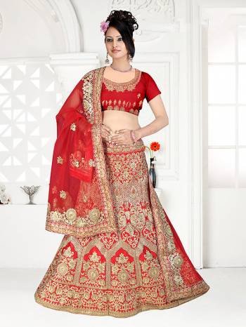 Get Ready For Your D-Day With This Very Beautiful And Evergreen Color For A Bridal Wear With This Designer Lehenga Choli In Red Color. This Heavy Embroidered Lehenga Choli Is Satin Silk Based Paired With Net Fabricated Dupatta. Its Lovely Bright Color And Heavy Embroidery Will Add Pretty Glam Look.