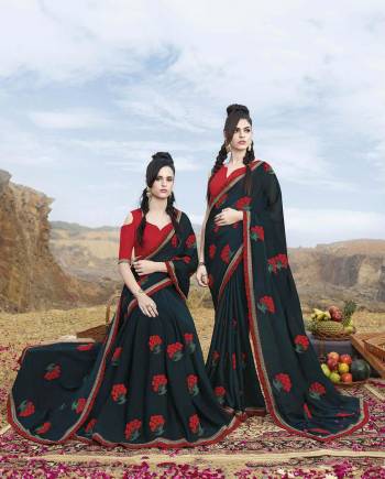 Here Is A Very Beautiful Designer Saree In New Shade With This Prussian Blue Color Paired With Contrasting Red Colored Blouse. This Saree Is Georgette Based Paired With Art Silk Fabricated Blouse. Buy this Saree Now. 