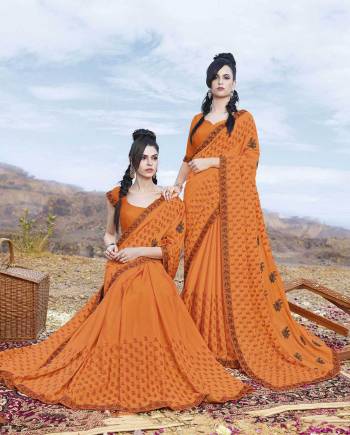 Attract All In This Designer Embroidered Saree In Orange Color Paired With Orange Colored Blouse. This Saree Is Fabricated On Georgette Paired With Art Silk Fabricated Blouse. Both The Fabrics Ensures Superb Comfort all Day Long. 