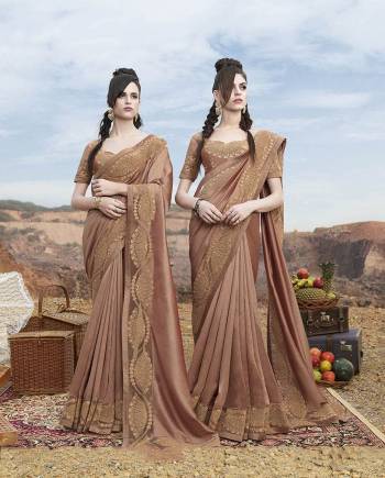 Flaunt Your Rich And Elegant Taste Wearing This Designer Saree In Beige Color Paired With Beige Colored Blouse. This Saree IS Fabricated On Georgette Paired With Art Silk Fabricated Blouse. Its Rich Color And Elegant Embroidery Will Definitely Earn You Lots Of Compliments From Onlookers.