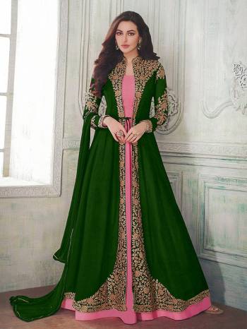 Here Is A Very Beautiful Designer Indo Western Suit In Pink Colored Inner Paired With Jacket Styled Top In Green Color. Also It Is Paired With Pink Colored Bottom and Green Dupatta. Its Beautiful Embroidered Jacket Is Fabricated On Georgette With Santoon Inner And Bottom And Chiffon Fabricated Dupatta. Buy This Lovely Designer Piece Now.