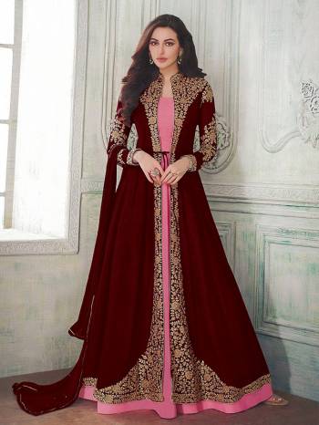 Here Is A Very Beautiful Designer Indo Western Suit In Pink Colored Inner Paired With Jacket Styled Top In Maroon Color. Also It Is Paired With Pink Colored Bottom and Maroon Dupatta. Its Beautiful Embroidered Jacket Is Fabricated On Georgette With Santoon Inner And Bottom And Chiffon Fabricated Dupatta. Buy This Lovely Designer Piece Now.