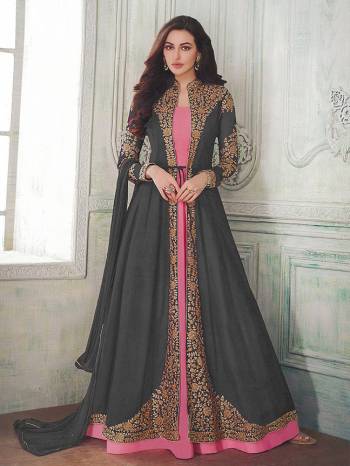 Here Is A Very Beautiful Designer Indo Western Suit In Pink Colored Inner Paired With Jacket Styled Top In Grey Color. Also It Is Paired With Pink Colored Bottom and Grey Dupatta. Its Beautiful Embroidered Jacket Is Fabricated On Georgette With Santoon Inner And Bottom And Chiffon Fabricated Dupatta. Buy This Lovely Designer Piece Now.