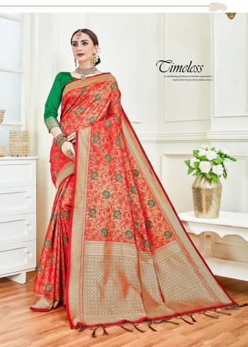 Shine Bright In This Designer Red Colored Saree Paired With Contrasting Green Colored Blouse. This Saree And Blouse are Fabricated on Soft And Art Silk Respectively. Buy This Pretty Saree Now.