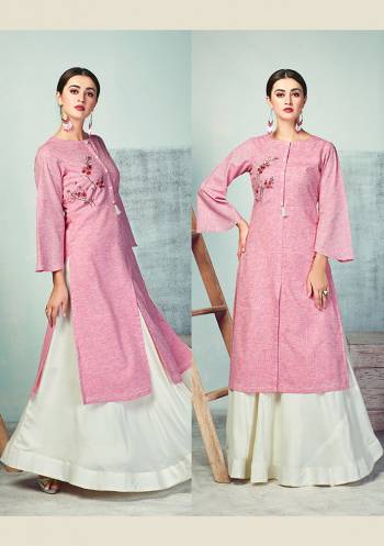 Add This Pretty Simple Readymade Pair Of Kurti And Skirt In Pink And White Color Respectively. It Kurti Is Fabricated On Handloom Cotton Paired With Rayon Fabricated Skirt. Both Its Fabrics Are Light Weight And Ensures Superb Comfort All Day Long. 