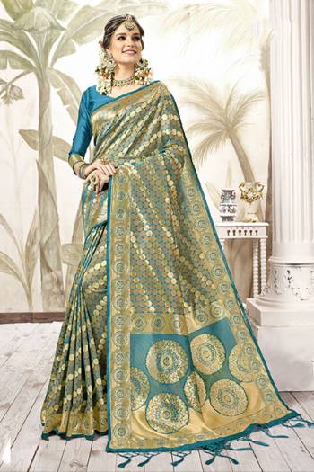 Celebrate This Festive Season In Proper Traditional Wear With This Silk Based Saree In Red Color . This Saree And Blouse Are Fabricated On Art Silk Beautified With Geometric Weave All Over. Its Fabric Is Light Weight, Durable And Easy To Care For. 