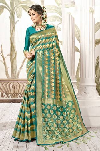 Celebrate This Festive Season In Proper Traditional Wear With This Silk Based Saree In Red Color . This Saree And Blouse Are Fabricated On Art Silk Beautified With Geometric Weave All Over. Its Fabric Is Light Weight, Durable And Easy To Care For. 