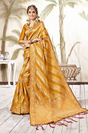 Celebrate This Festive Season In Proper Traditional Wear With This Silk Based Saree In Red Color . This Saree And Blouse Are Fabricated On Art Silk Beautified With Geometric Weave All Over. Its Fabric Is Light Weight, Durable And Easy To Care For. 