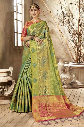 Add This Very Pretty Silk Based Saree To Your Wardrobe With Golden Highlight. This Saree Is Fabricated On Art Silk Paired With Art Silk Fabricated Blouse. It Is Beautified With Heavy Weave All Over It.