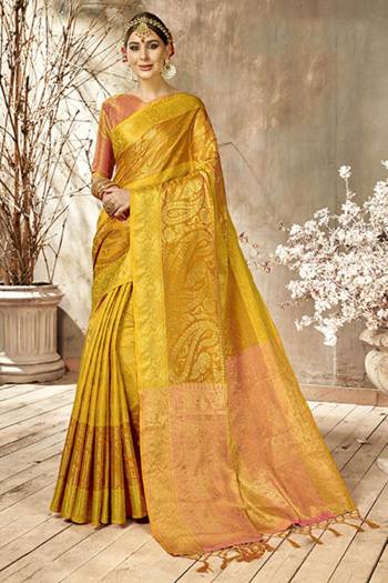 Add This Very Pretty Silk Based Saree To Your Wardrobe With Golden Highlight. This Saree Is Fabricated On Art Silk Paired With Art Silk Fabricated Blouse. It Is Beautified With Heavy Weave All Over It.