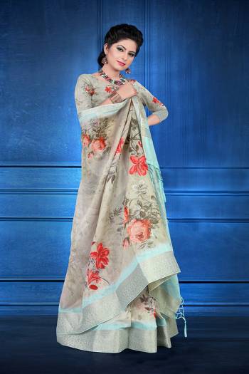 Here Is A Rich And Elegant Looking Designer Silk Based Saree. This Pretty Saree and Blouse Are Fabricated On Jacquard Silk Beautified With Digital Prints All Over. It Is Light In Weight And Easy To Carry All Day Long. 