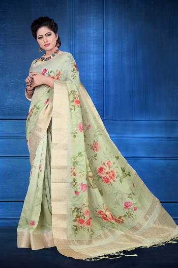 Here Is A Rich And Elegant Looking Designer Silk Based Saree. This Pretty Saree and Blouse Are Fabricated On Jacquard Silk Beautified With Digital Prints All Over. It Is Light In Weight And Easy To Carry All Day Long. 