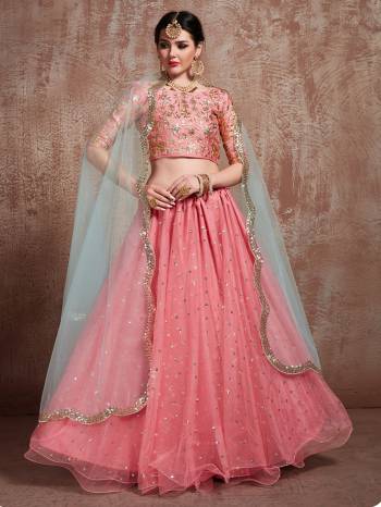 This Wedding Season, Look The Most Attractive Of All Weading This Heavy Designer Lehenga Choli In Pink Color Paired With Contrasting Grey Colored Dupatta. Its Blouse Is Fabricated On Art Silk Paired With Net Fabricated Lehenga And Dupatta. Buy Now.