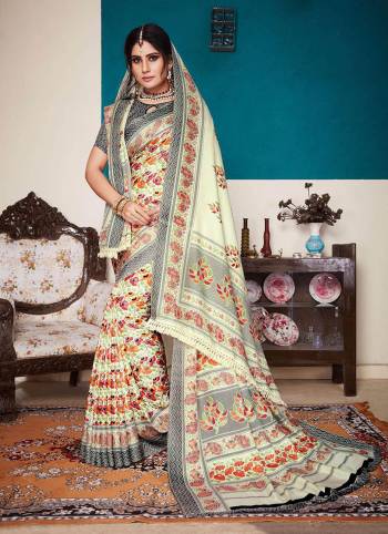 Rich And Elegant Looking Designer Printed Saree Is Here In Cream And Black Color. This Pretty Saree Is Fabricated On Pashmina Which Also Comes With A Lovely Dupatta To Pair With The Saree. This Dupatta Over The Saree Is The Trending Pattern These Days. Buy Now.