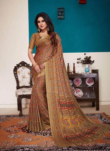 Rich And Elegant Looking Designer Printed Saree Is Here In Shades Of Brown. This Pretty Saree Is Fabricated On Pashmina Which Also Comes With A Lovely Dupatta To Pair With The Saree. This Dupatta Over The Saree Is The Trending Pattern These Days. Buy Now.