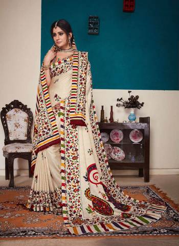 Rich And Elegant Looking Designer Printed Saree Is Here In Cream And Multi Color. This Pretty Saree Is Fabricated On Pashmina Which Also Comes With A Lovely Dupatta To Pair With The Saree. This Dupatta Over The Saree Is The Trending Pattern These Days. Buy Now.