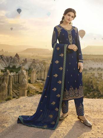 Get Ready For The Upcoming Festive And Wedding Season Wearing This Heavy Designer Straight Suit In All Over Blue Color. Its Top Is Fabricated On Satin Georgette Paired With Santoon Bottom And Georgette Fabricated Dupatta. Its Top, Bottom And Dupatta Are Beautified With Heavy Embroidery Giving It An Attractive Look. 