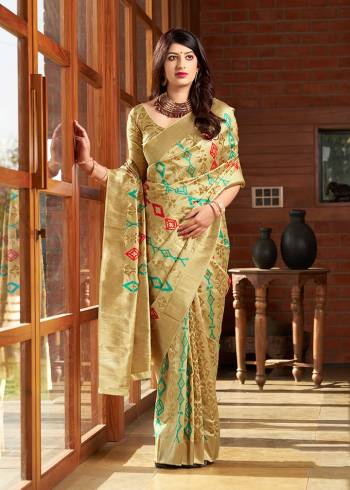 Celebrate This Festive Season In A Traditional Look Wearing This Designer Silk Based Saree In Cream Color. This Saree And Blouse Are Fabricated On Banarasi Art Silk Beautified With Weave All Over. 