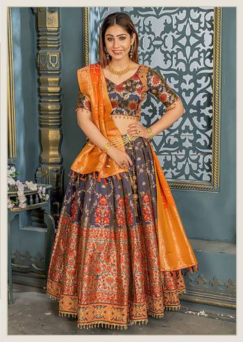 Get Ready For The Upcoming Festive Season On Navratri With This Designer Silk Based Lehenga Choli. This Embroidered And Heavy Weaved Lehenga Choli And Dupatta Are Fabricated On Banarasi Art Silk Which Also Gives A Rich Look To Your Personality. 