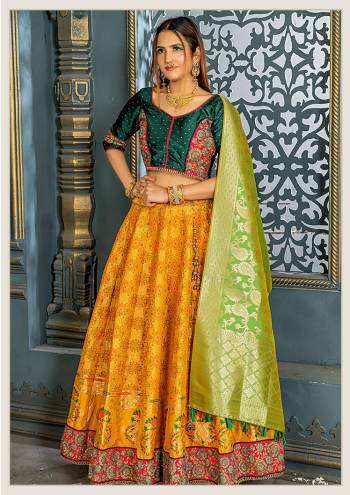 Get Ready For The Upcoming Festive Season On Navratri With This Designer Silk Based Lehenga Choli. This Embroidered And Heavy Weaved Lehenga Choli And Dupatta Are Fabricated On Banarasi Art Silk Which Also Gives A Rich Look To Your Personality. 