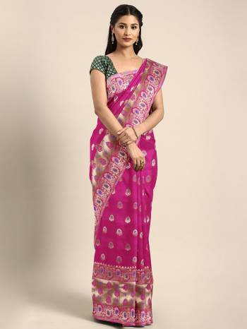 Celebrate This Festive Season In Traditional Look Wearing This Silk Based Saree In Dark Pink Color. This Saree And Blouse are Fabricated On Art Silk Beautified With Weave All Over. 