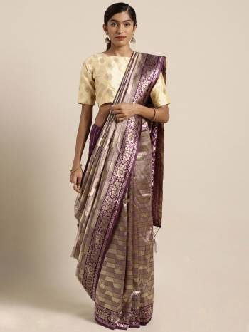 Celebrate This Festive Season In Traditional Look Wearing This Silk Based Saree In Purple Color. This Saree And Blouse are Fabricated On Banarasi Art Silk Beautified With Weave All Over