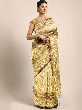 Celebrate This Festive Season In Traditional Look Wearing This Silk Based Saree In Beige  Color. This Saree And Blouse are Fabricated On Kanjivaram Art Silk Beautified With Weave All Over