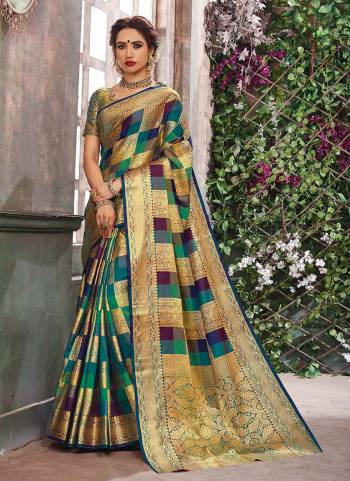 Celebrate This Festive Season With Colors Wearing This Designer Multi Colored Saree Fabricated On Art Silk. It Has Multi Colored Checks All Over With Beautiful Weave. Buy This Pretty Saree Now.