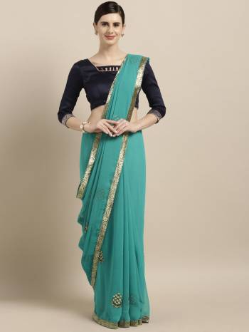 Go With The Shades Of Blue Wearing This Pretty Saree In Blue Color Paired With Navy Blue Colored Blouse. This Saree Is Fabricated On Chiffon Paired With Art Silk Fabricated Blouse. Buy Now.