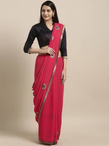 Look Pretty In This Beautiful Small Motif Embroidered Saree In Pink Color Paired With Black Colored Blouse. This Saree Is Fabricated On Georgette Paired With Art Silk Fabricated Blouse. It Is Light In Weight And Easy To Carry All Day Long. 