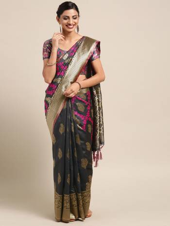 Celebrate This Festive Season In Traditional Look Wearing This Silk?Based Saree In Black Color. This Saree And Blouse are Fabricated On Banarasi Art Silk Beautified With Weave All Over