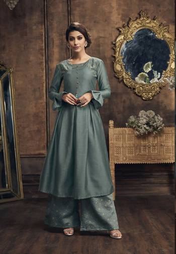 New And Unique Shade Is Here To Add Into Your Wardrobe With This Designer Readymade Pair Of Kurti And Plazzo In Teal Grey Color. It Is Fabricated On Soft Silk Beautified With Embroidery And Foil Prints. Buy This Pretty Pair Now.