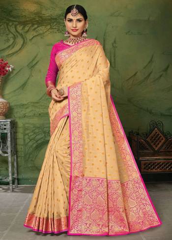 Celebrate This Festive Season With Beauty And Comfort In This Elegant Looking Designer Silk Based Saree In Cream Color. This Saree And Blouse Are Fabricated On Art Silk Beautified With Small Butti Weave All Over. Buy Now.