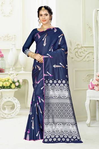 Enhance Your Personality Wearing This Designer Silk Based Saree In Navy Blue Color Paired With Navy Blue Colored Blouse. This Saree And Blouse Are Fabricated On Banarasi Art Silk Beautified With Pretty Motif Weave. 