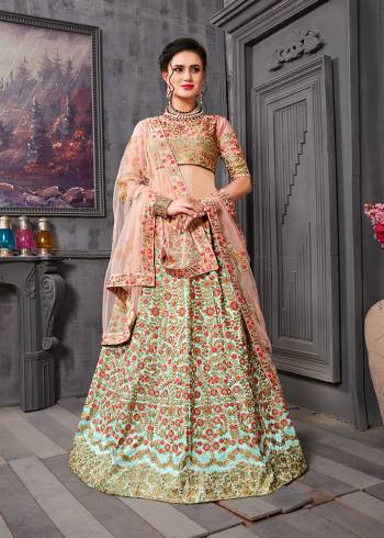 You Will Definitely Earn Lots Of Compliments When You Doll Up In This Pretty Color Pallete Of Baby Pink And Aqua Blue Color. This Very Elegant And Heavy Embroidered Lehenga Choli IS Fabricated On Art Silk Paired With Net Fabricated Dupatta. Buy This Pretty Piece Now.