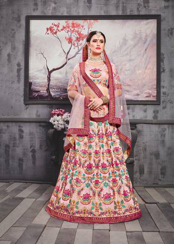 Adorn A Very Pretty Look Wearing This Heavy Designer Lehenga Choli In All Over Pastel Pink Color. Its Blouse And Lehenga Are Fabricated On Art Silk Paired With Net Fabricated Dupatta. It Is Beautified With Contrasting Resham Embroidery Which Gives A Heavy And Attractive Look To It. Buy Now.