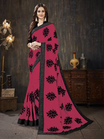 Here Is A Very Pretty Designer Silk Based Saree In Dark Pink Color Paired With Black Colored Blouse. It Is Beautified With Black Colored Thread Work Motifs All Over. Also It Is Light In Weight And Easy To Carry Throughout The Gala. Buy Now.