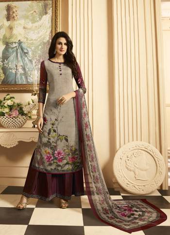 Here Is A Very Pretty Digital Printed Suit In Grey And Wine Color. Its Top And Bottom Are Fabricated On Crepe Paired With Georgette Fabricated Dupatta. Its Fabrics Are Soft Towards Skin Which Ensures Superb Comfort All Day Long. 