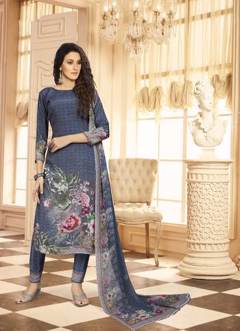 Simple And Elegant Looking Straight Suit with Utmost Comfort Is Here In Navy Blue Color. This Suit Is Crepe Based Beautified With Digital Print Paired With Georgette Fabricated Dupatta. Buy Now.