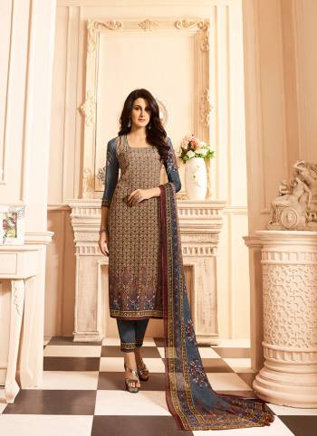 Here Is A Very Pretty Digital Printed Suit In Brown And Dark Blue Color. Its Top And Bottom Are Fabricated On Crepe Paired With Georgette Fabricated Dupatta. Its Fabrics Are Soft Towards Skin Which Ensures Superb Comfort All Day Long. 