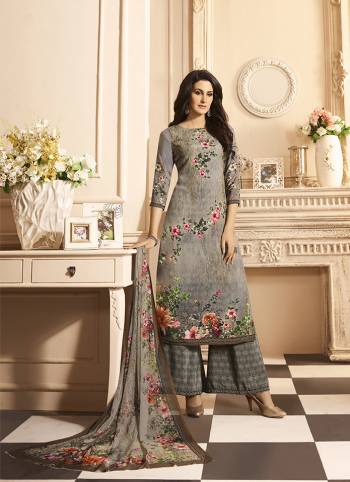 For Your Semi-Casuals Or Festive Wear, Grab This Pretty Digital Printed Suit In Grey Color. Its Top and Bottom Are Fabricated on Crepe Paired With Georgette Fabricated Dupatta. It IS Beautified With Digital Prints All Over It. 