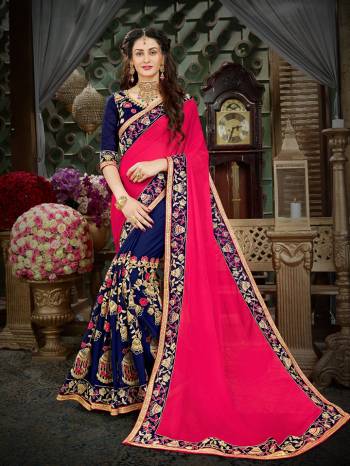 Get Ready For The Upcoming Festive And Wedding Season Wearing This Designer Saree In Dark Pink And Navy Blue Color Paired With Navy Blue Colored Blouse. This Saree Is Fabricated On Georgette Paired With Art Silk Fabricated Blouse. Buy Now.