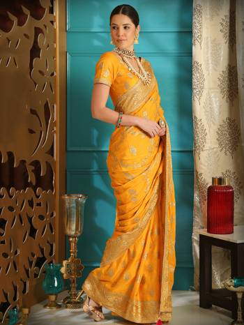 Get Ready For The Upcoming Wedding Season With This Heavy Designer Saree In Musturd Yellow Color. This Saree And Blouse Are Fabricated On Soft Silk Beautified With Jari Embroidery And Stone Work. Its Pretty Jari Work Gives A Rich And Subtle Look To Your Personality. 